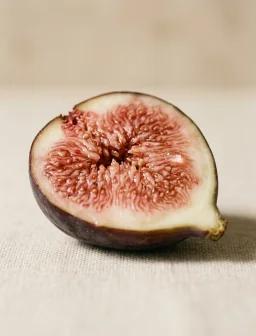 A ripe fig cut in half